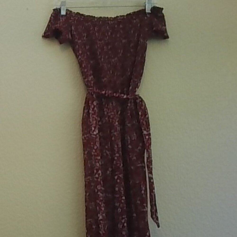 Off the shoulder red floral patterned jumpsuit